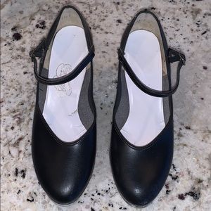 Tap Shoes. Run small. Would fit 7.5 or 8 better.